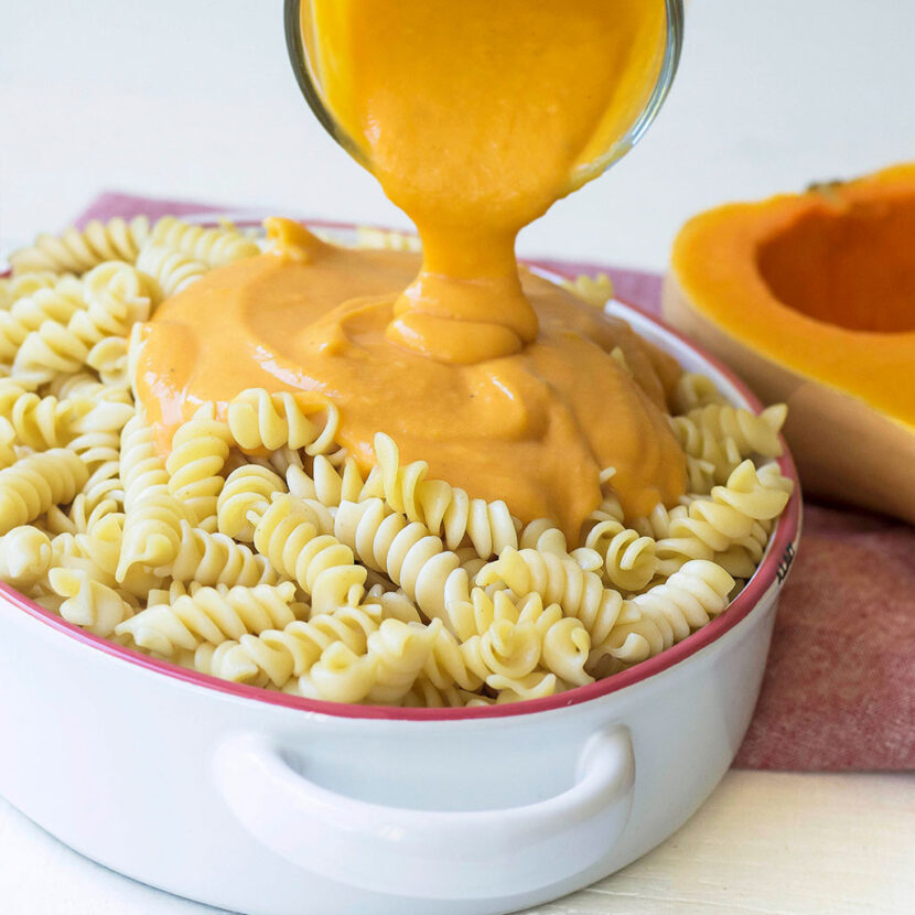Image of prepared Butternut Squash Mac and Cheese made with butternut squash, Pacific Foods™ Organic Coconut Unsweetened Plant-Based Beverage, Pacific Foods® Organic Vegetable Broth, rotini pasta and sunflower seeds.