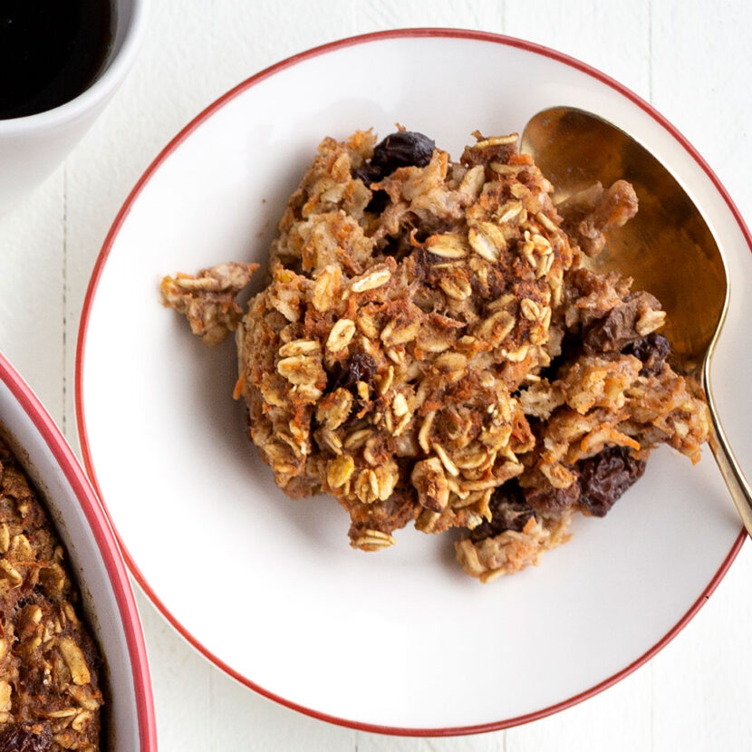 An image of prepared Carrot Cake Baked Oatmeal made with oats, Pacific Foods® Hemp Unsweetened Original Beverage maple syrup, walnuts, carrots and raisins.