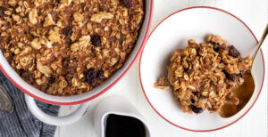 An image of prepared Carrot Cake Baked Oatmeal made with oats, Pacific Foods® Hemp Unsweetened Original Beverage maple syrup, walnuts, carrots and raisins.