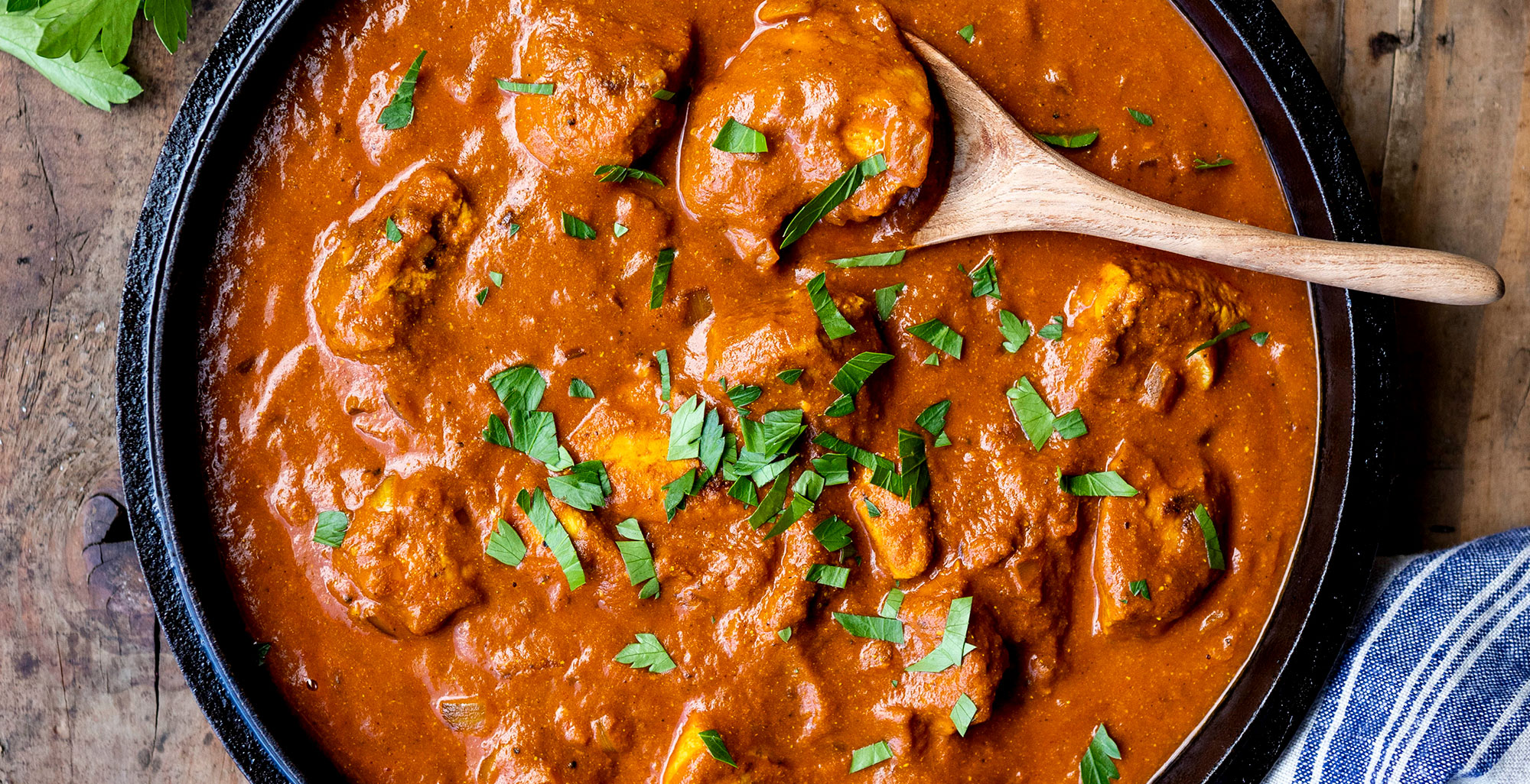 An image of prepared Chicken Tikka Masala made with Pacific Foods® Organic Free Range Low Sodium Chicken Broth, Pacific Foods® Organic Coconut Unsweetened Plant-Based Beverage, cilantro, tomato, ginger, garam masala and chicken.