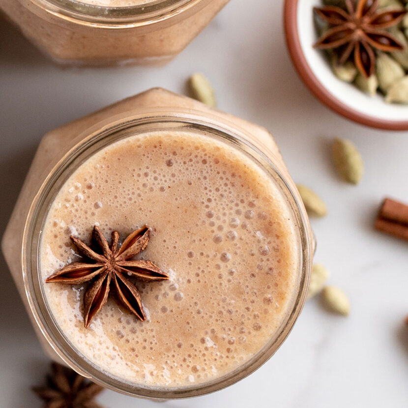 An image of prepared Dairy-Free Coconut Chai Smoothie made with Pacific Foods® Organic Coconut Unsweetened Original Beverage, banana, dates and spices.
