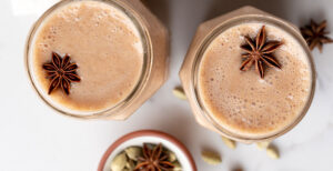 An image of prepared Dairy-Free Coconut Chai Smoothie made with Pacific Foods® Organic Coconut Unsweetened Original Beverage, banana, dates and spices.