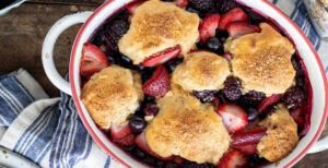 An image of prepared Dairy-Free Berry Cobbler made with mixed berries, rolled oats and Pacific Foods® Organic Oat Original Beverage.