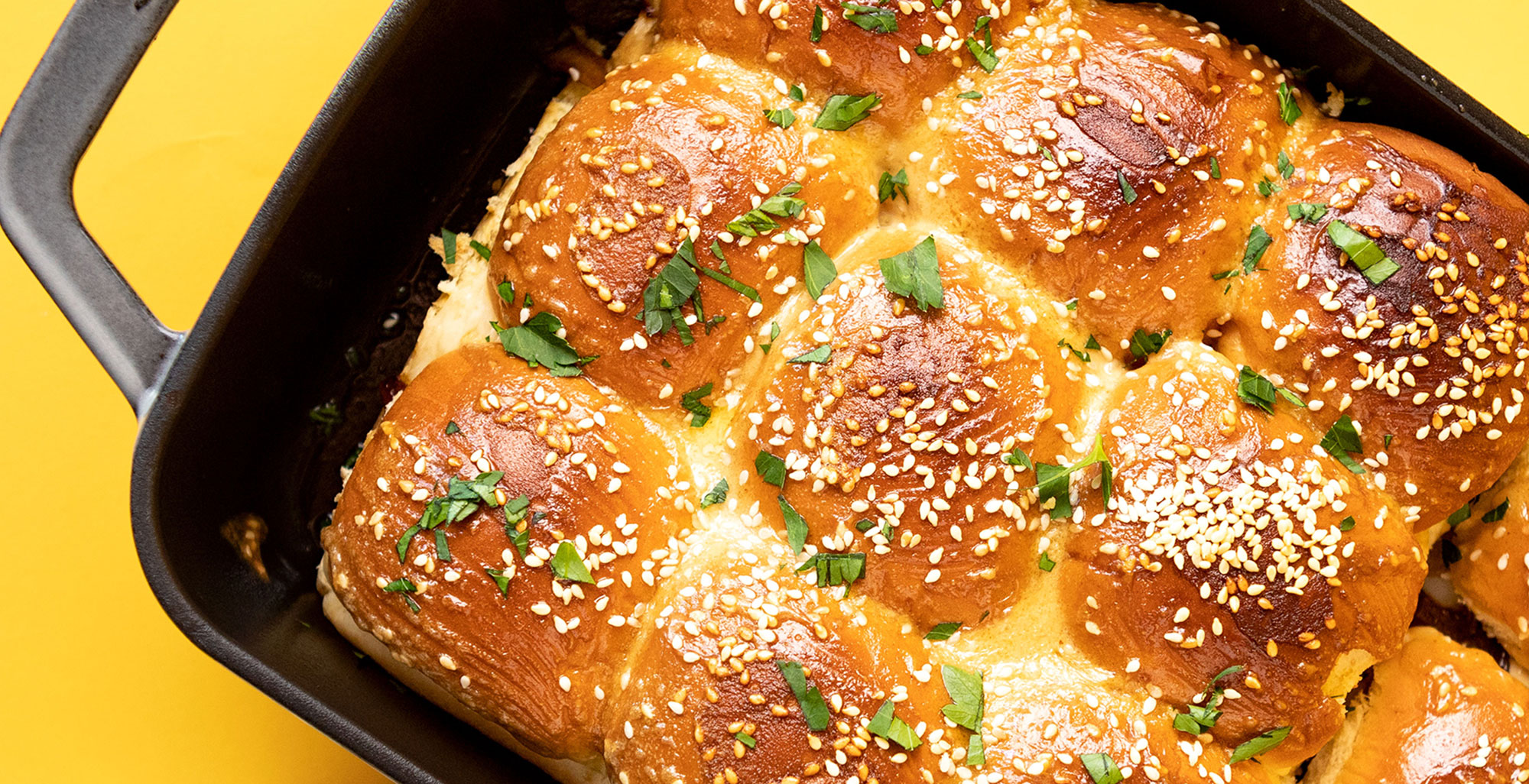 An image of prepared French Dip Sliders with Au Jus Sauce made with slider buns, deli style roast beef, provolone and Pacific Foods® Organic Beef Broth.