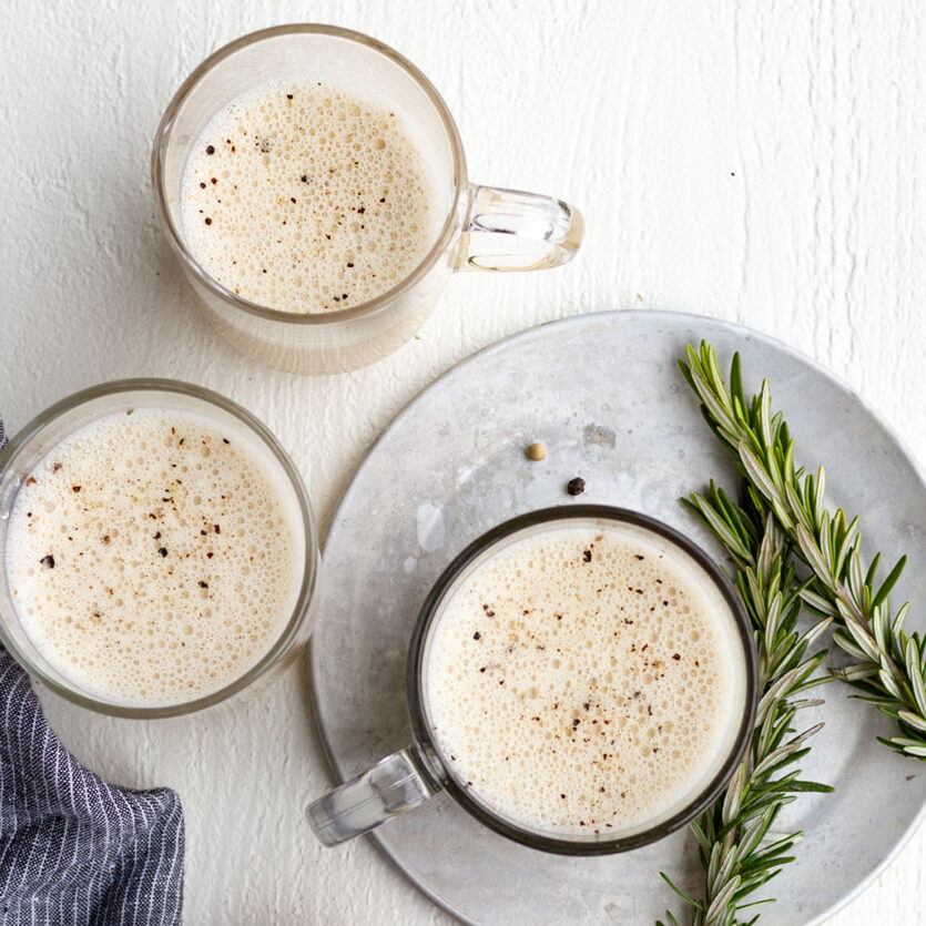 An image of prepared Garlic and Rosemary Fatty Bone Broth made with Pacific Foods® Organic Beef Bone Broth, garlic, rosemary and butter.