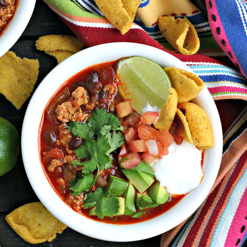 An image of prepared Instant Pot® Chicken Taco Soup made with black beans, chicken, tomatoes, and Pacific Foods® Organic Low Sodium Free Range Chicken Broth.