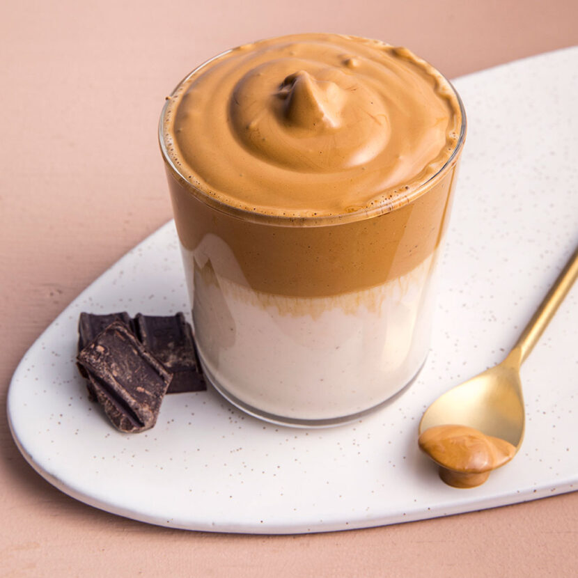 An image of prepared Irish Dalgona Coffee made with instant coffee powder, whiskey, Irish cream liqueur, Pacific Foods® Hemp Vanilla Beverage and chocolate.