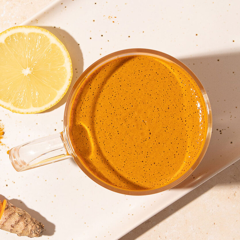 An image of prepared Keto Bone Broth Turmeric Latte made with Pacific Foods® Organic Salted Chicken Bone Broth, clarified butter, lemon juice and turmeric.