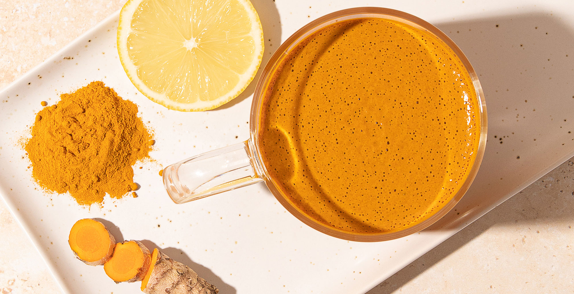 An image of prepared Keto Bone Broth Turmeric Latte made with Pacific Foods® Organic Salted Chicken Bone Broth, clarified butter, lemon juice and turmeric.