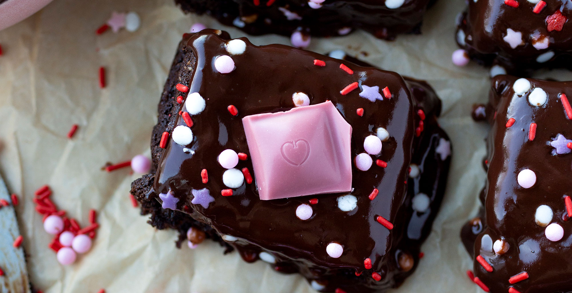 An image of prepared Plant-Based Brownies with Chocolate Almond Ganache made with Pacific Foods® Almond Vanilla Beverage and chocolate chips.