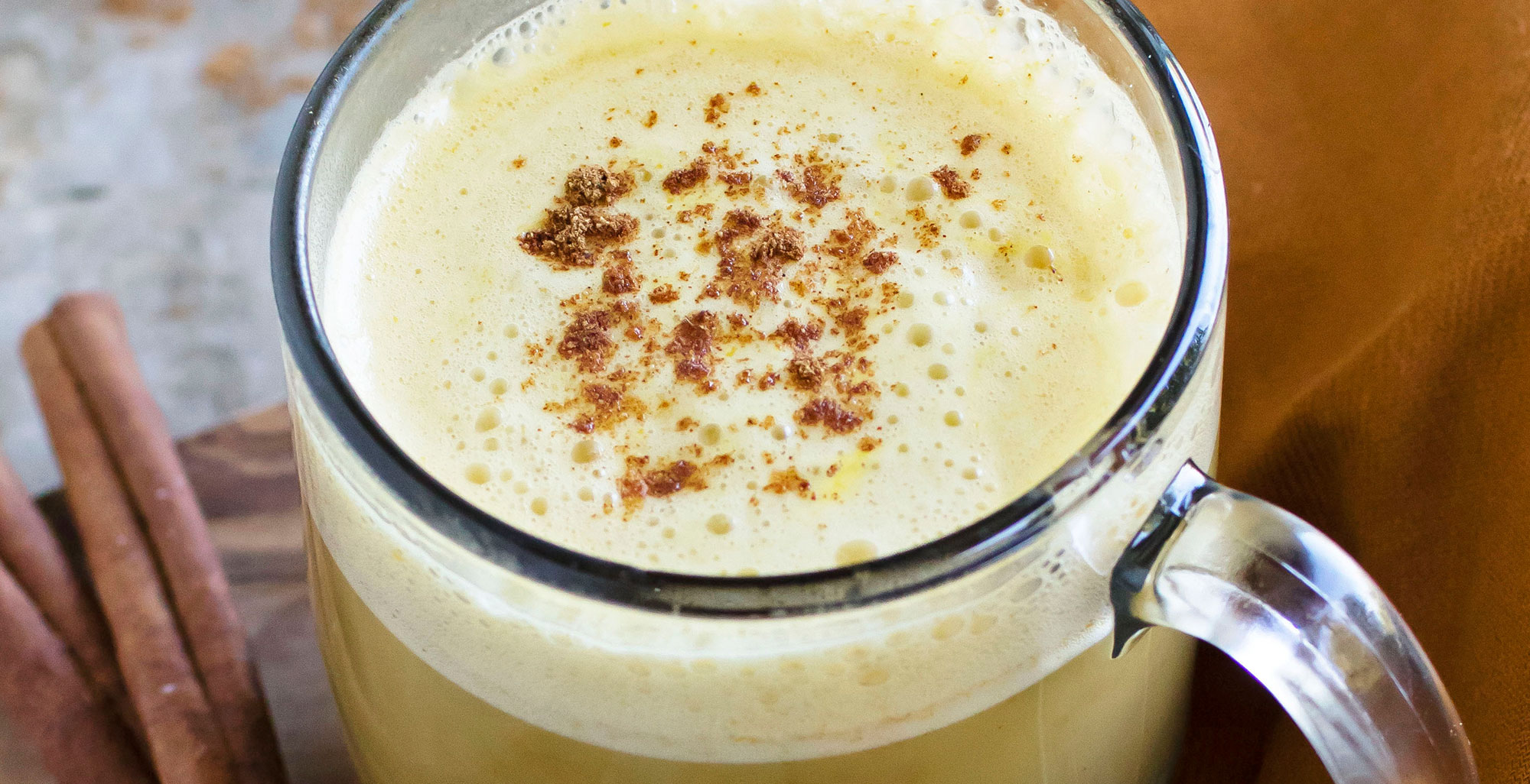 An image of prepared Pumpkin 'Nice' Latte made with Pacific Foods® Organic Oat Original Plant-Based Beverage, pumpkin puree, maple syrup, vanilla and coffee.