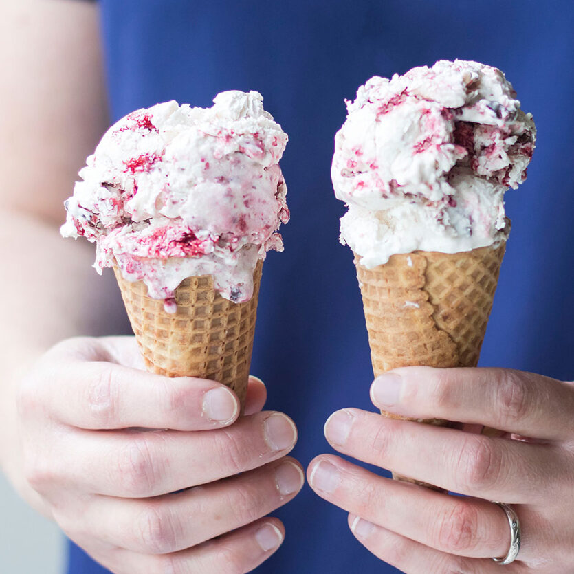 An image of prepared Raspberry Fudge Swirl Coconut Ice Cream made with raspberries, chocolate chips, Pacific Foods® Organic Coconut Original Beverage, unsweetened coconut cream and sugar.
