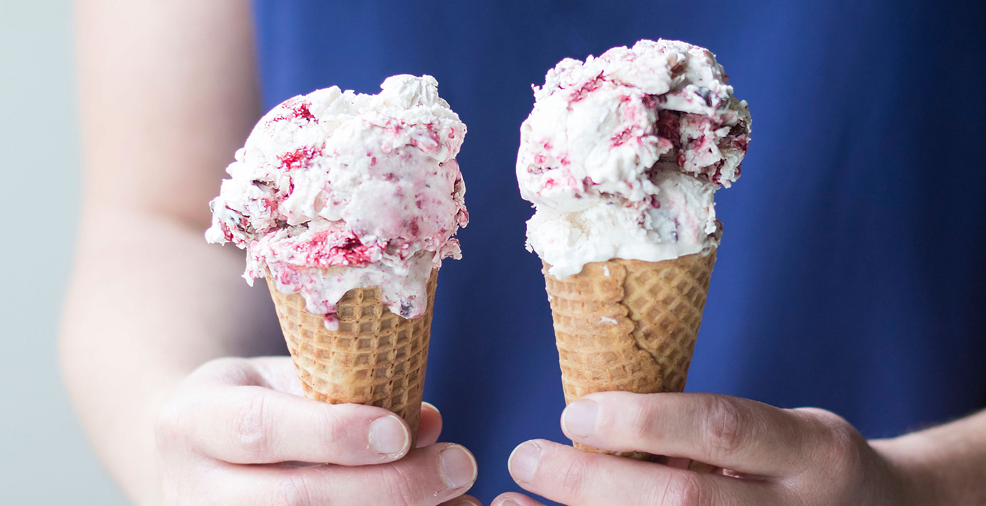 An image of prepared Raspberry Fudge Swirl Coconut Ice Cream made with raspberries, chocolate chips, Pacific Foods® Organic Coconut Original Beverage, unsweetened coconut cream and sugar.