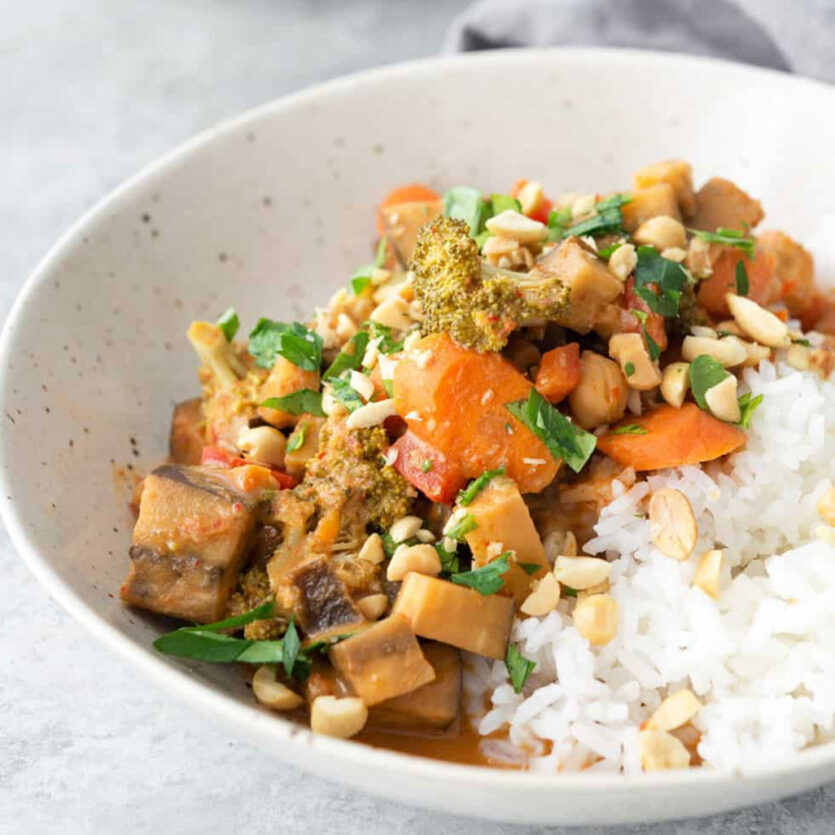 An image of prepared Slow Cooker Coconut Curry made with bell pepper, eggplant, Pacific Foods® Organic Coconut Original Beverage, peanut butter, broccoli and chickpeas.