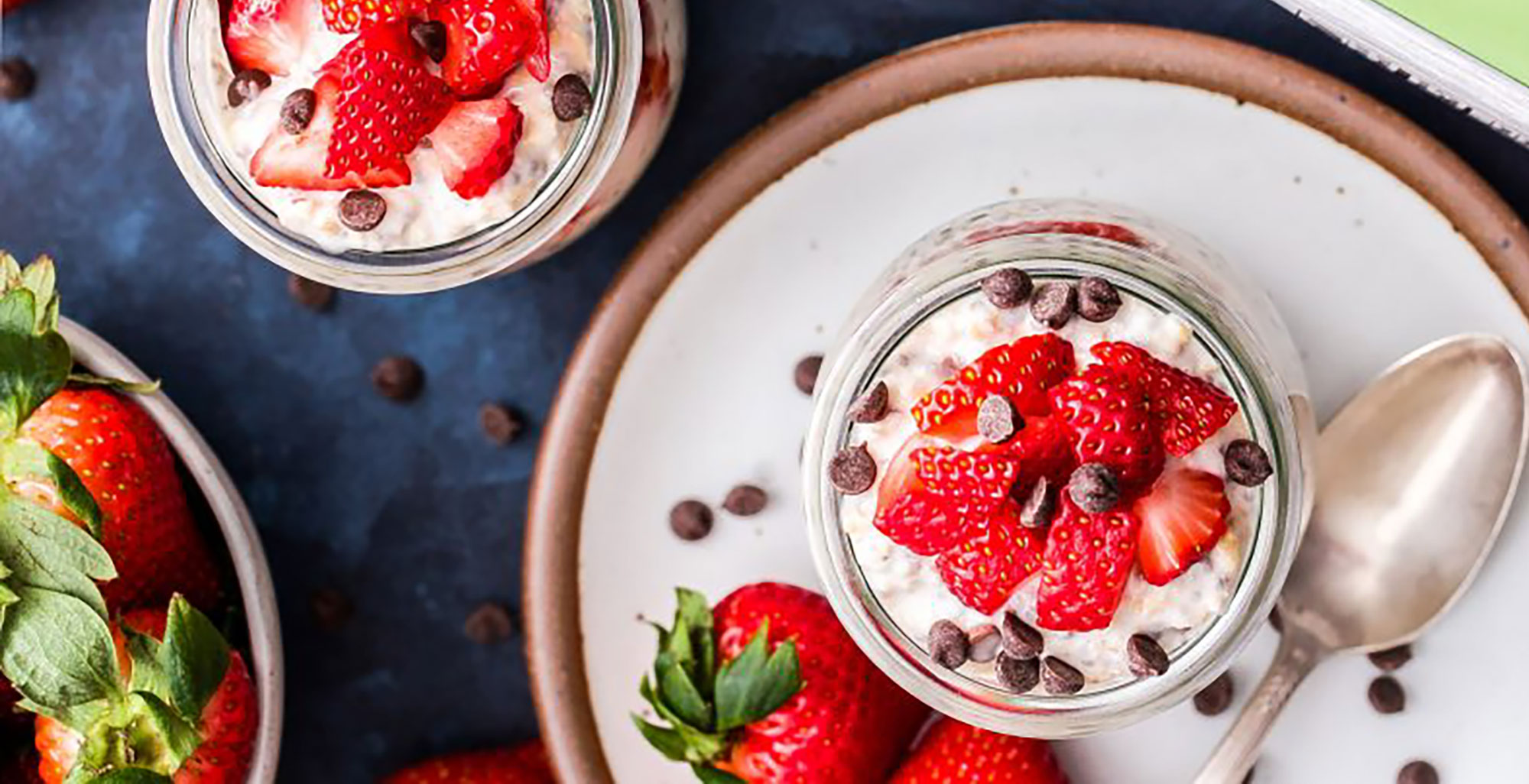 An image of prepared Strawberry Chocolate Chip Overnight Oats made with Pacific Foods® Organic Oat Original Beverage, yogurt, rolled oats, strawberries, chia seeds and mini chocolate chips.