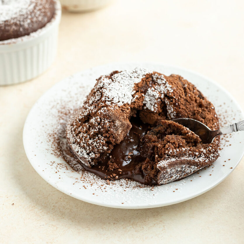 An image of prepared Vegan, Gluten-Free Chocolate Lava Cake made with chocolate chips, Pacific Foods® Organic Oat Original Beverage, oats, almond flour, cocoa powder and banana.