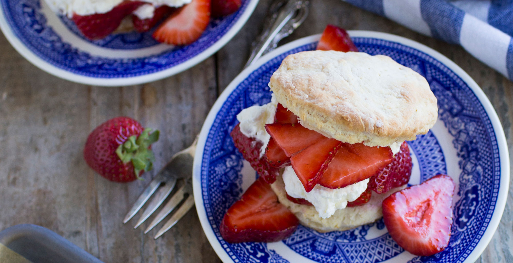 An image of prepared Vegan Strawberry Shortcake made with strawberries, Pacific Foods® Organic Oat Original Beverage, unsweetened coconut milk, maple syrup and strawberries.
