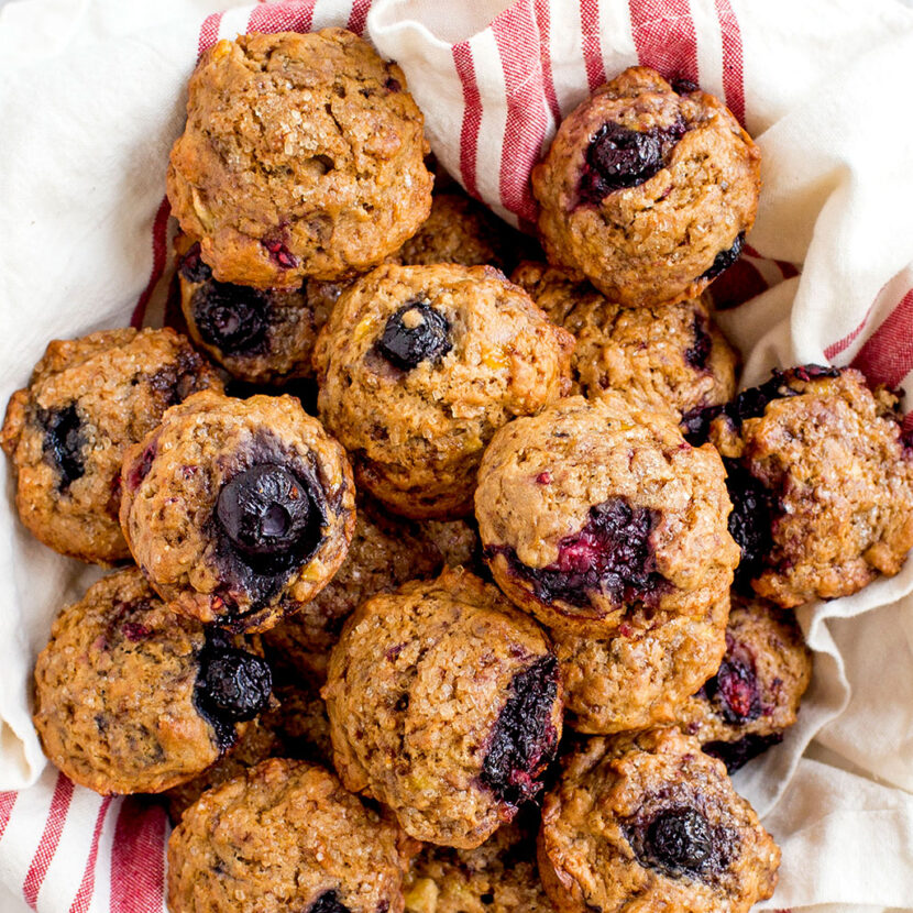 An image of prepared Vegan, Gluten-Free Very Berry Mini Muffins made with banana, Pacific Foods® Organic Oat Original Beverage, mixed berries and gluten free flour.