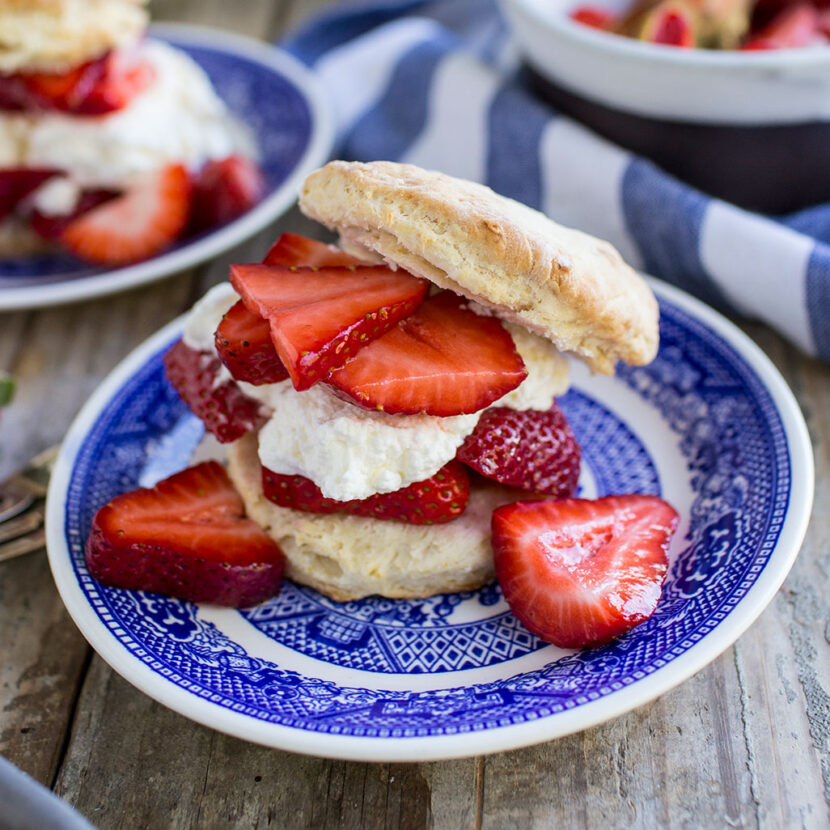 An image of prepared Vegan Strawberry Shortcake made with strawberries, Pacific Foods® Organic Oat Original Beverage, unsweetened coconut milk, maple syrup and strawberries.