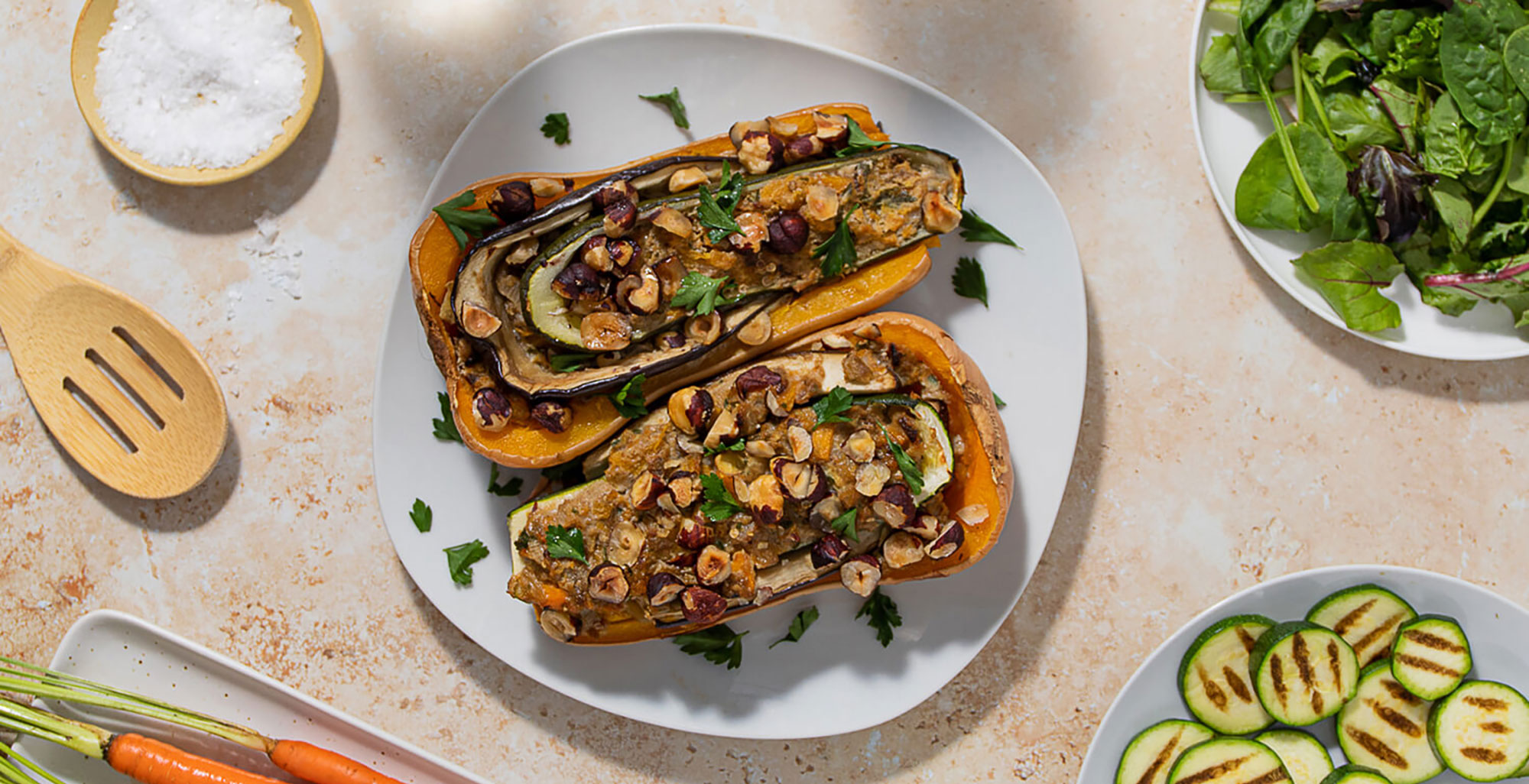 An image of prepared Veggie Stuffed Butternut Squash (aka Butternut Zucchini Plant) made with zucchini, eggplant, butternut squash, parsley, Pacific Foods® Organic Vegetable Broth, thyme and hazelnuts.