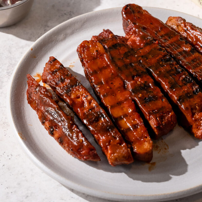 An image of prepared BBQ Seitan Ribs made with vital wheat gluten, Pacific Foods® Organic Vegetable Broth, barbecue sauce and soy sauce.