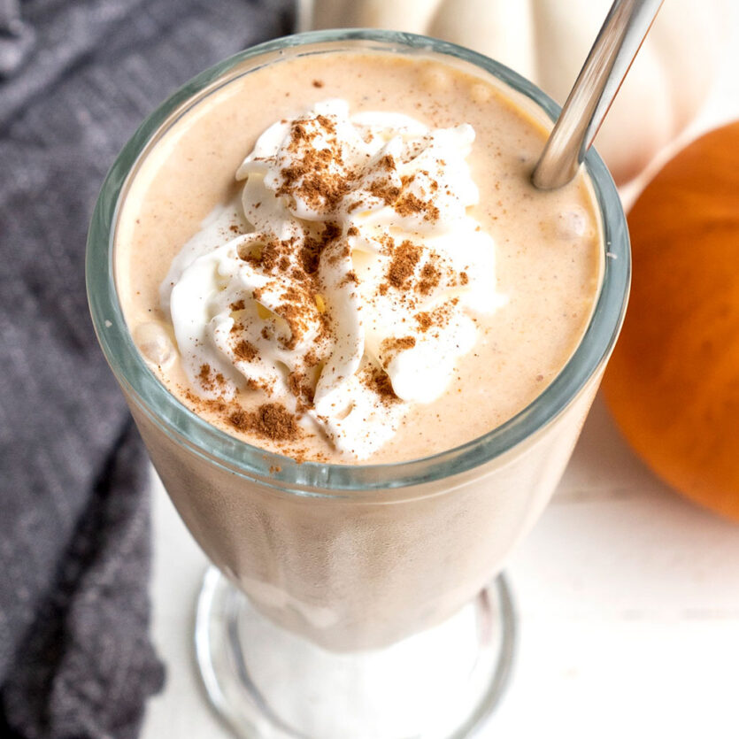An image of prepared Dairy-Free Caramel Pumpkin Spice Shake made with pumpkin pie, ice cream, Pacific Foods® Hemp Original Beverage, whipped cream and cinnamon.