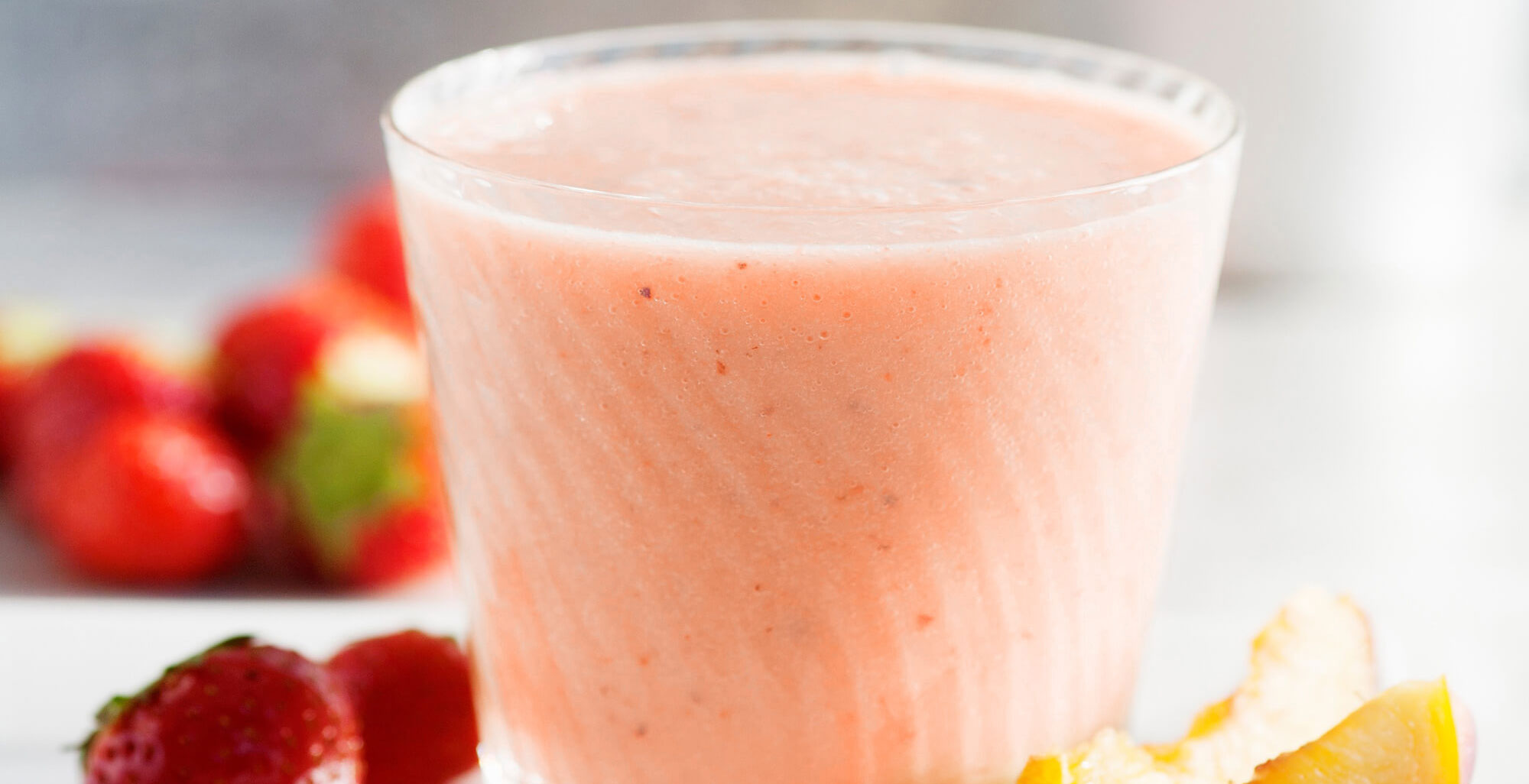 An image of prepared Strawberry Peach Mango Smoothie made with mango, peaches, strawberries and Pacific Foods® Hemp Original Beverage.