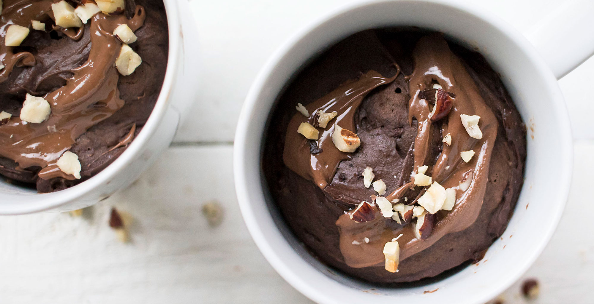 An image of prepared Chocolate Mini Cakes with Hazelnut Cream made with Pacific Foods® Organic Almond Original Beverage, chocolate chips and hazelnuts.