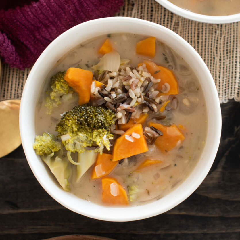 An image of prepared Autumn Broccoli Potato Soup made with Pacific Foods™ Organic Low Sodium Vegetable Broth, sweet potato, broccoli, wild rice and Pacific Foods® Hemp Unsweetened Original Beverage.