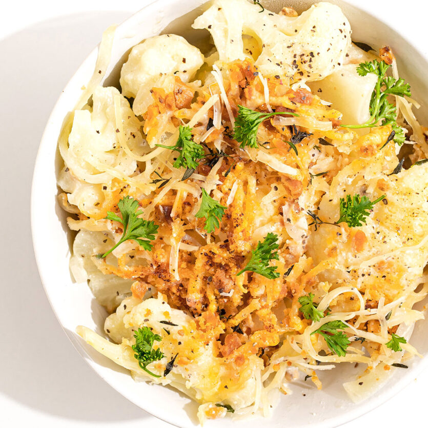 An image of prepared Creamy Cauliflower Bake made with Pacific Foods® Organic Cream of Chicken Condensed Soup, Pacific Foods® Organic Free Range Chicken Broth, cauliflower and milk.