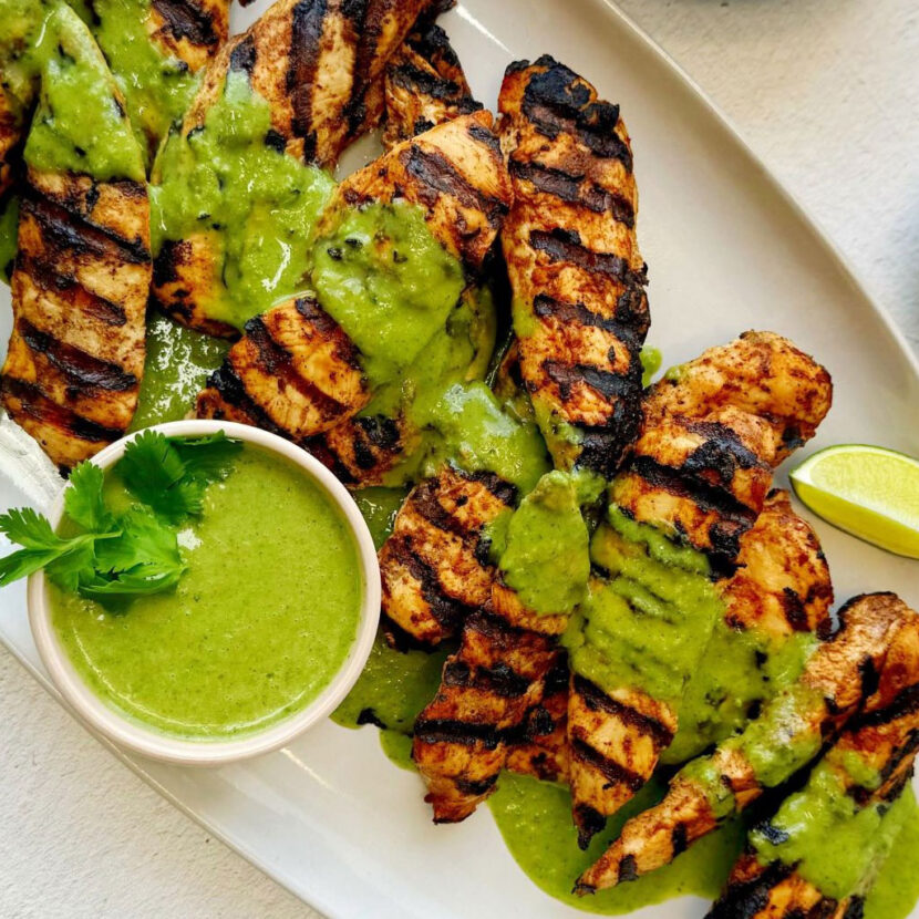 An image of prepared Peruvian Chicken with Aji Verde Sauce made with Pacific Foods® Organic Condensed Cream of Celery Soup, honey, chicken, jalapeño peppers and cilantro.