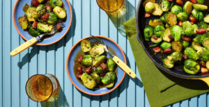 An image of prepared Bourbon Glazed Brussels Sprouts made with pancetta, Brussels sprouts, Pacific Foods® Organic Free Range Chicken Broth, brown sugar, bourbon, thyme and red pepper flakes.