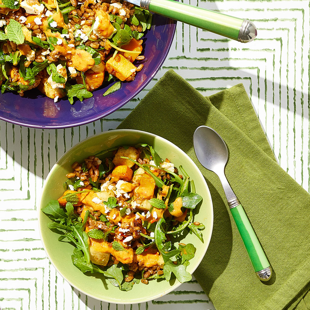 An image of prepared Farro and Roasted Vegetable Bone Broth Bowl made with Pacific Foods® Organic Chicken Bone Broth with Sea Salt, farro, sweet potato, parsnips, baby arugula, feta cheese and mint.