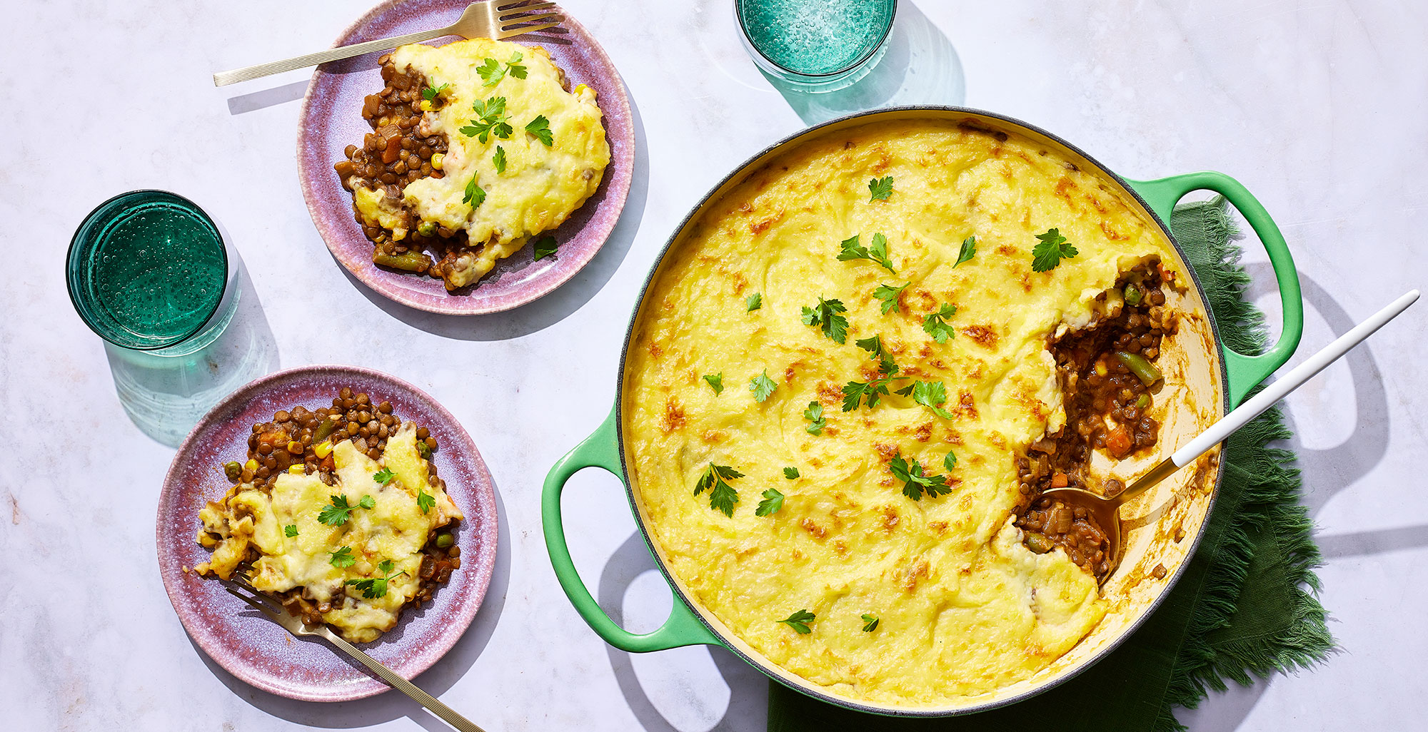 An image of prepared Lentil and Vegetable Shepherd's Pie with Rosemary made with Yukon Gold potatoes, onion, garlic, tomato paste, rosemary, Pacific Foods® Organic Low Sodium Vegetable Broth, lentils and vegetables.