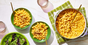 An image of prepared One-Pot Butternut Squash Mac & Cheese made with butternut squash, Pacific Foods® Organic Low Sodium Vegetable Broth, cavatappi pasta, half and half, fontina and Gruyère cheese.