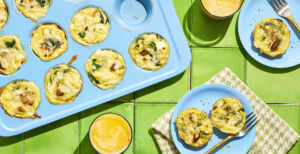 An image of prepared Spinach and Mushroom Egg Bites made with mixed wild mushrooms, baby spinach, eggs, Pacific Foods® Organic Cream of Mushroom Condensed Soup, dill, feta cheese and fontina cheese.