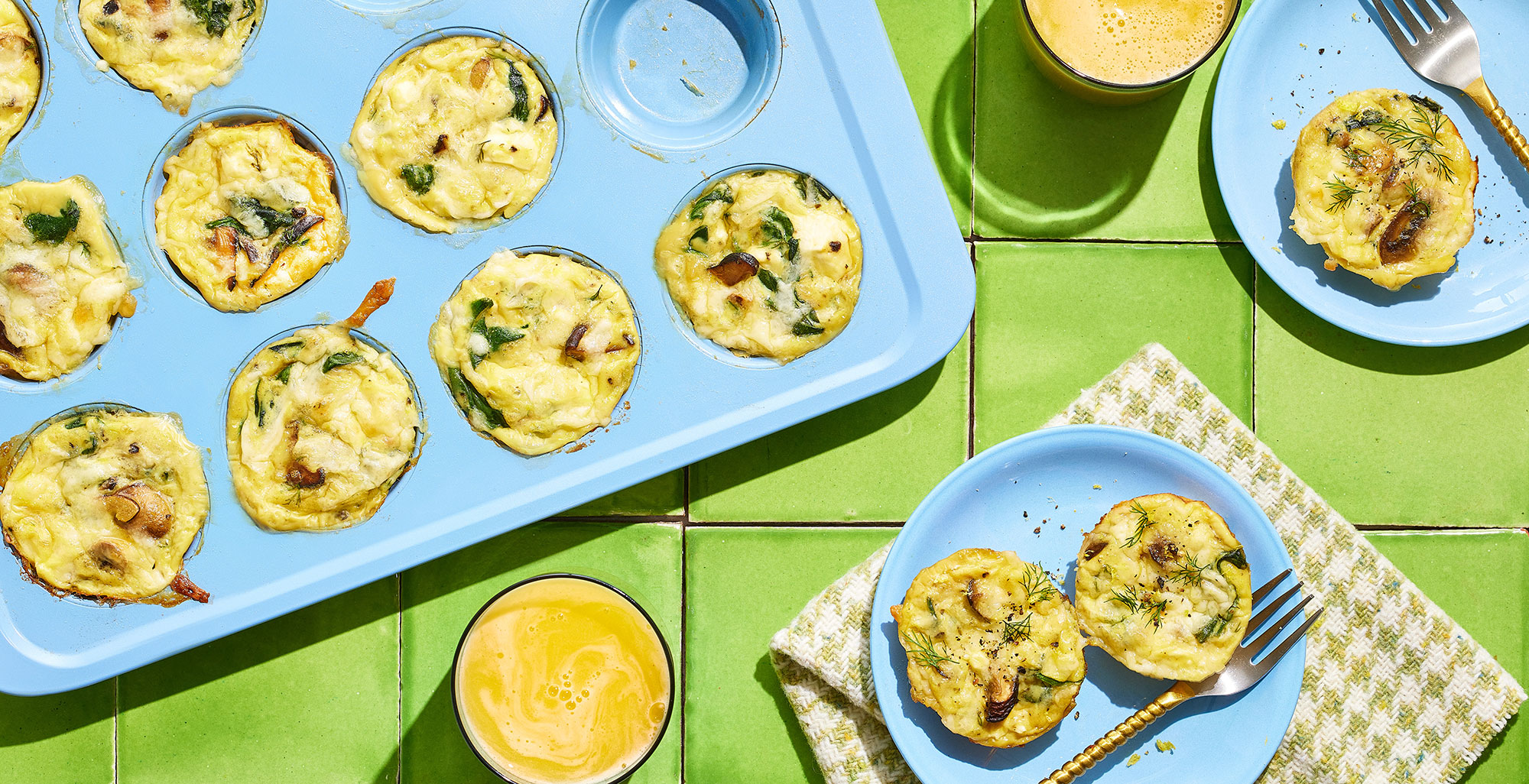 An image of prepared Spinach and Mushroom Egg Bites made with mixed wild mushrooms, baby spinach, eggs, Pacific Foods® Organic Cream of Mushroom Condensed Soup, dill, feta cheese and fontina cheese.