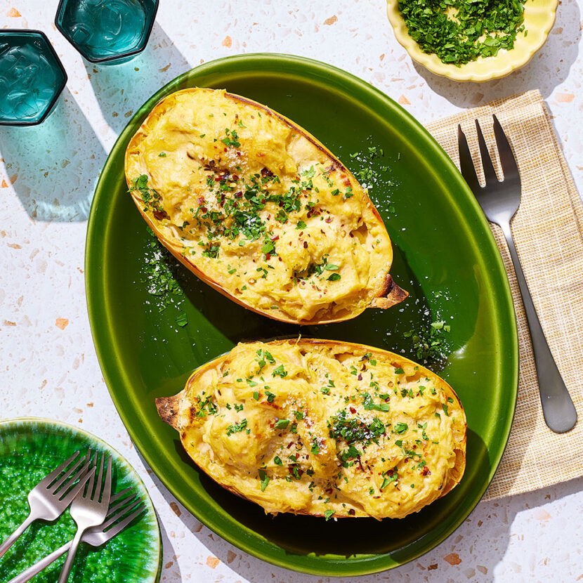 An image of prepared Vegan Roasted Garlic Spaghetti Squash Alfredo made with spaghetti squash, garlic, Pacific Foods® Organic Low Sodium Vegetable Broth and cashews.