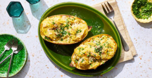 An image of prepared Vegan Roasted Garlic Spaghetti Squash Alfredo made with spaghetti squash, garlic, Pacific Foods® Organic Low Sodium Vegetable Broth and cashews.