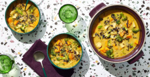 An image of prepared Vegan Broccoli Potato Soup made with Pacific Foods® Organic Low Sodium Vegetable Broth, wild rice, sweet potato, parsnips, broccoli and Pacific Foods™ Hemp Original Plant-Based Beverage.