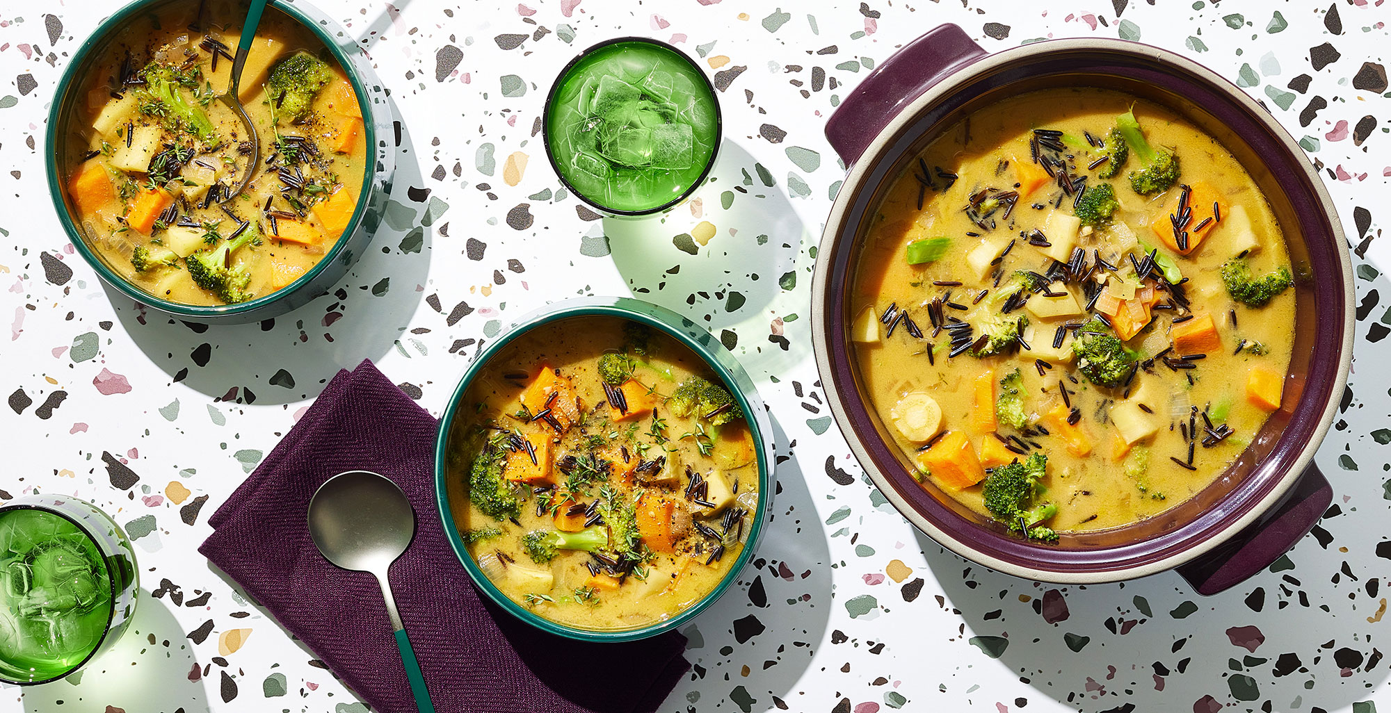 An image of prepared Vegan Broccoli Potato Soup made with Pacific Foods® Organic Low Sodium Vegetable Broth, wild rice, sweet potato, parsnips, broccoli and Pacific Foods™ Hemp Original Plant-Based Beverage.