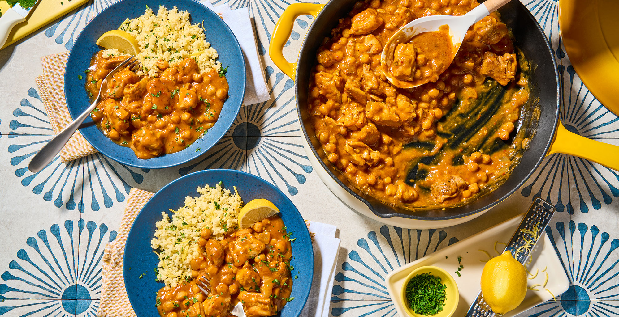 An image of prepared Butternut Harissa Chicken with Couscous made with chicken, za'atar seasoning, onion, Pacific Foods® Organic Butternut Squash Soup with Cinnamon and Nutmeg, chickpeas, cilantro, couscous and Pacific Foods® Organic Free Range Chicken Broth.