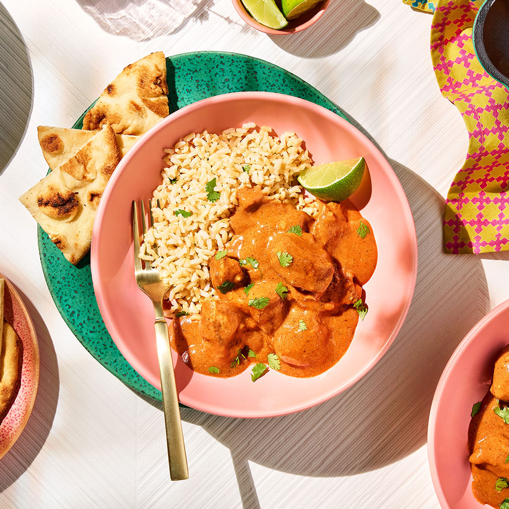 An image of prepared Chicken Tikka Masala made with basmati rice, chicken, ginger, Pacific Foods® Organic Condensed Tomato Soup and yogurt.