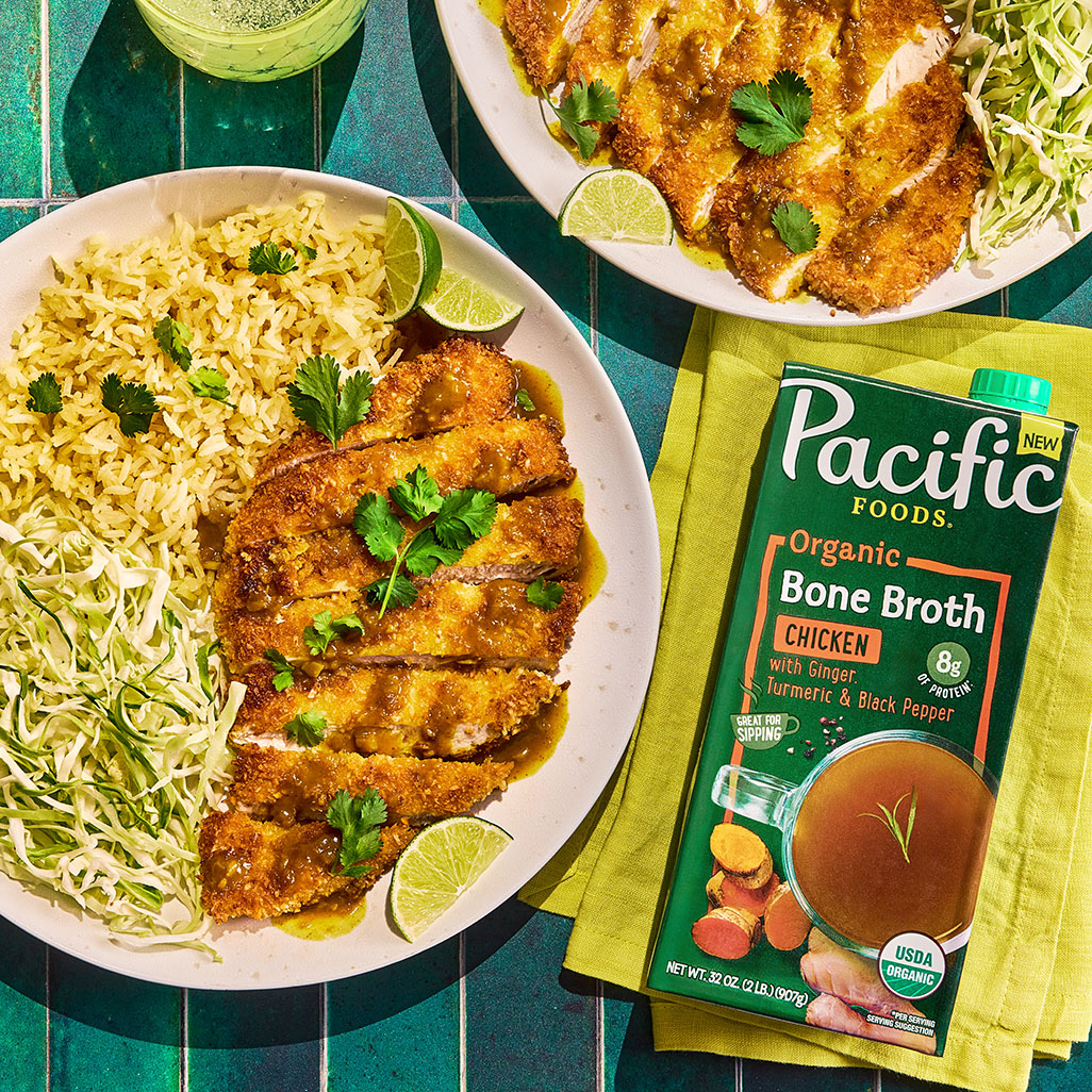 An image of prepared Coconut Chicken Katsu Curry made with garlic, curry, Pacific Foods® Organic Chicken Bone Broth with Ginger, Turmeric, and black pepper, coconut milk, mango chutney and chicken.