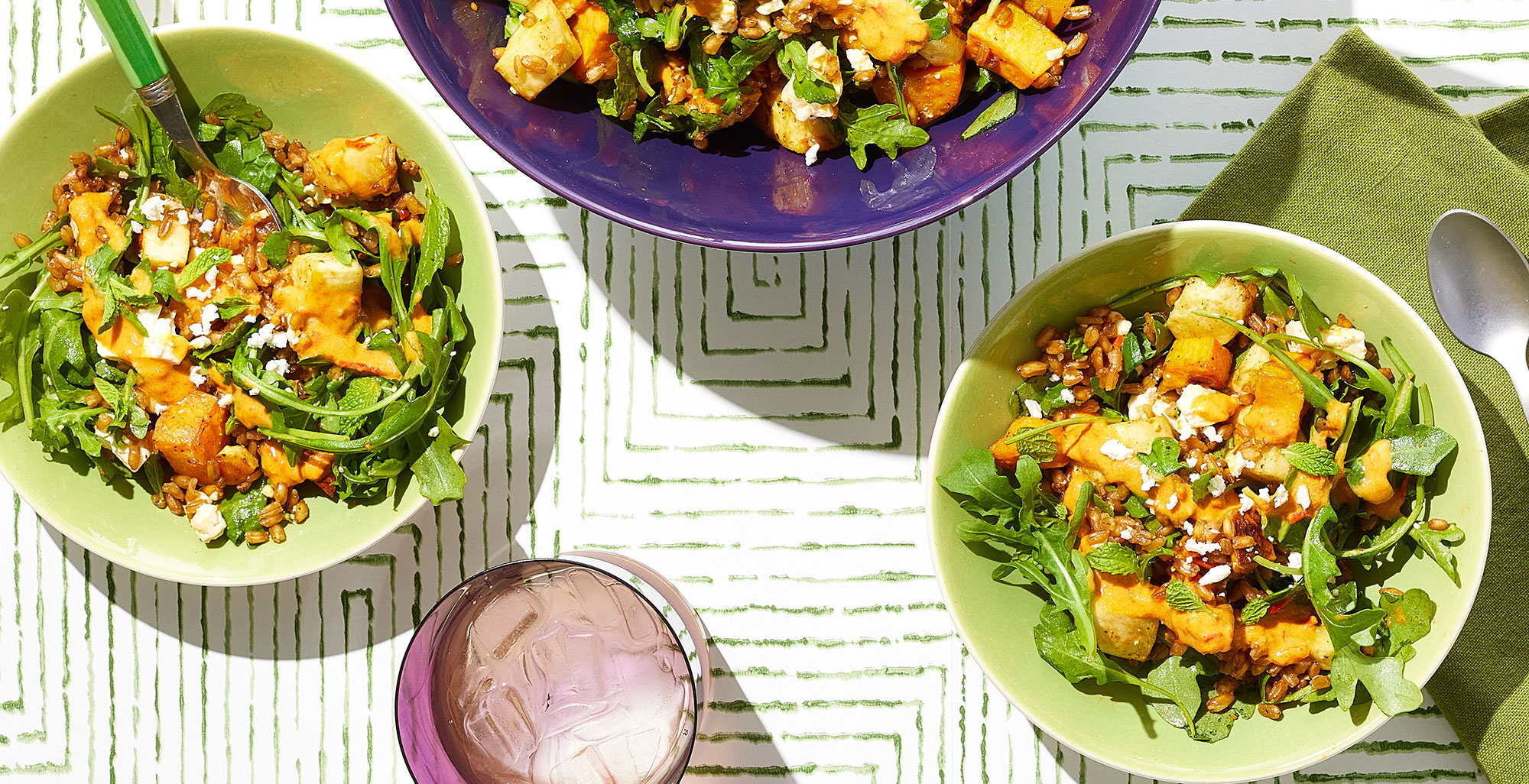 An image of prepared Farro and Roasted Vegetable Bone Broth Bowl made with Pacific Foods® Organic Chicken Bone Broth with Sea Salt, farro, sweet potato, parsnips, baby arugula, feta cheese and mint.