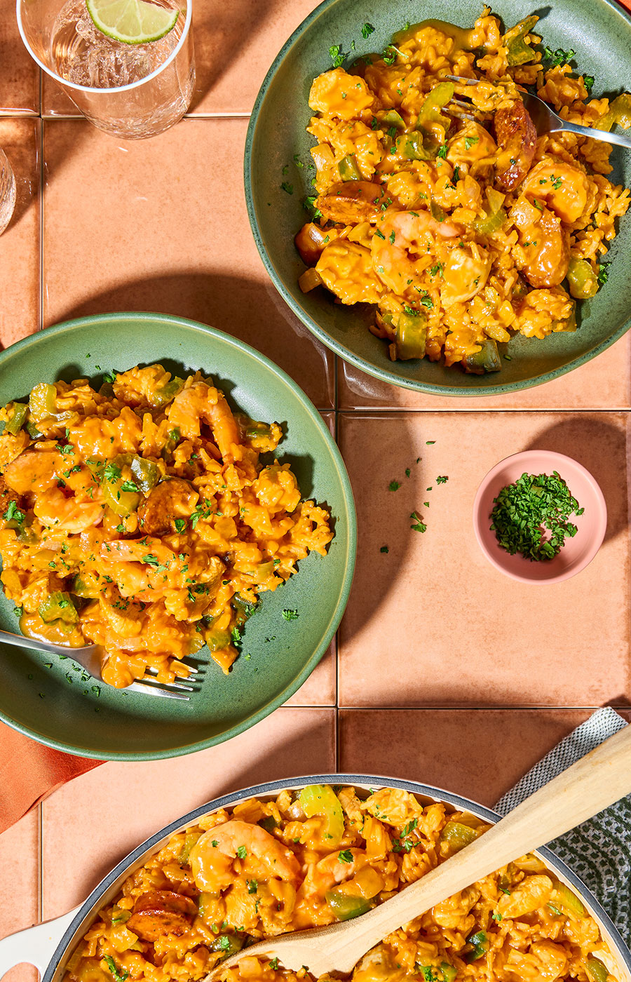 An image of prepared Creamy One-Pot Risotto-Style Jambalaya made with chicken, Cajun seasoning, andouille sausage, white rice, Pacific Foods® Organic Low Sodium Free Range Chicken Broth, Pacific Foods® Organic Spicy Garden Tomato Soup and shrimp.