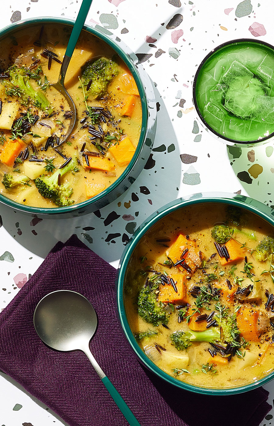 An image of prepared Vegan Broccoli Potato Soup made with Pacific Foods® Organic Low Sodium Vegetable Broth, wild rice, sweet potato, parsnips, broccoli and Pacific Foods™ Hemp Original Plant-Based Beverage.