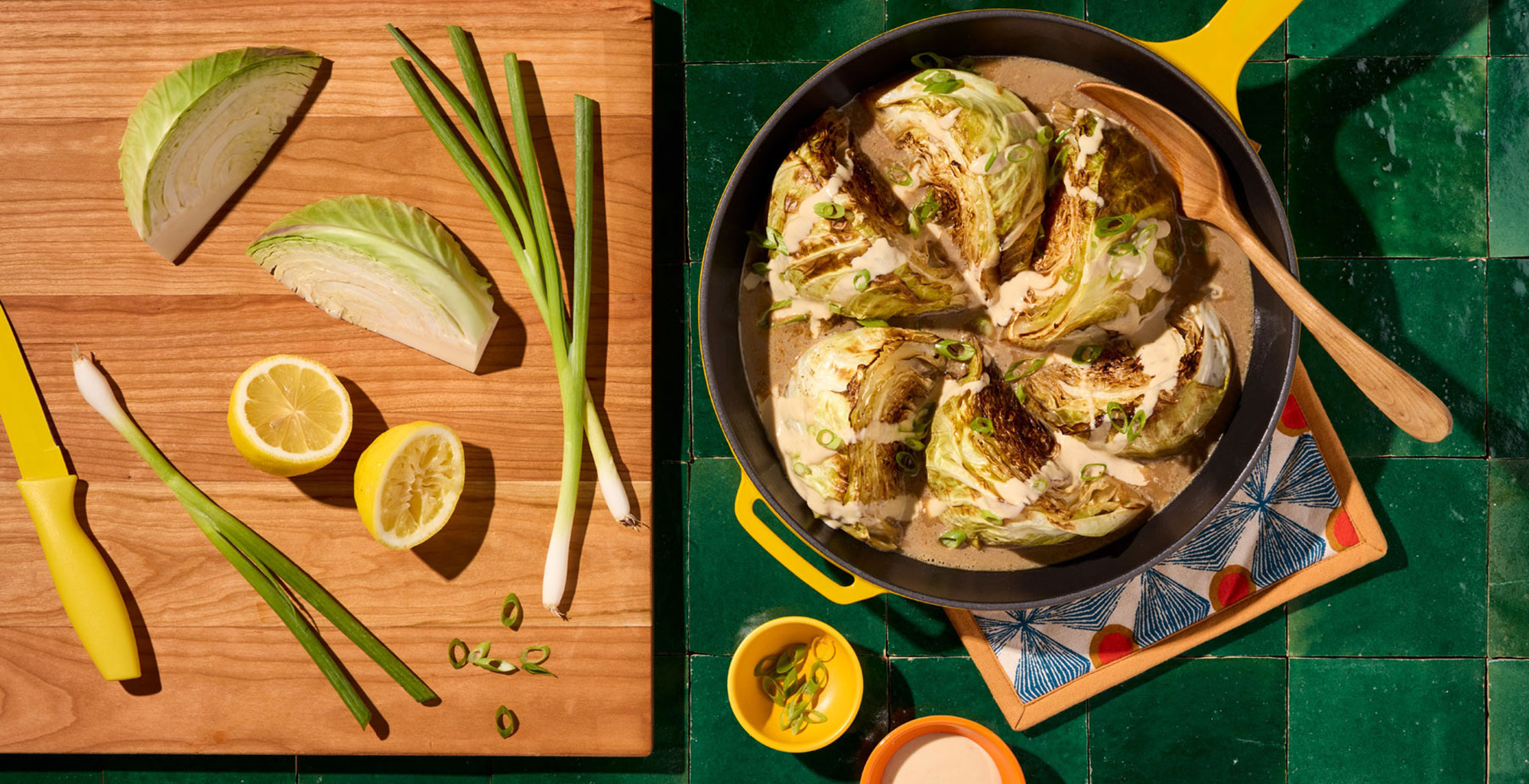 An image of prepared Miso Braised Cabbage with Lemon-Tahini Drizzle made with green cabbage, Pacific Foods® Organic Chicken Miso Ramen Broth, tahini paste, lemon juice and maple syrup.